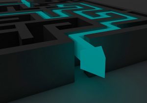 a blue arrow illuminates the way out of a maze