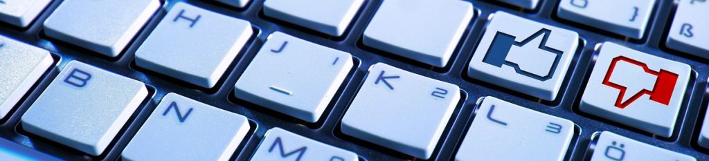 a keyboard with thumbs-up and thumbs-down keys