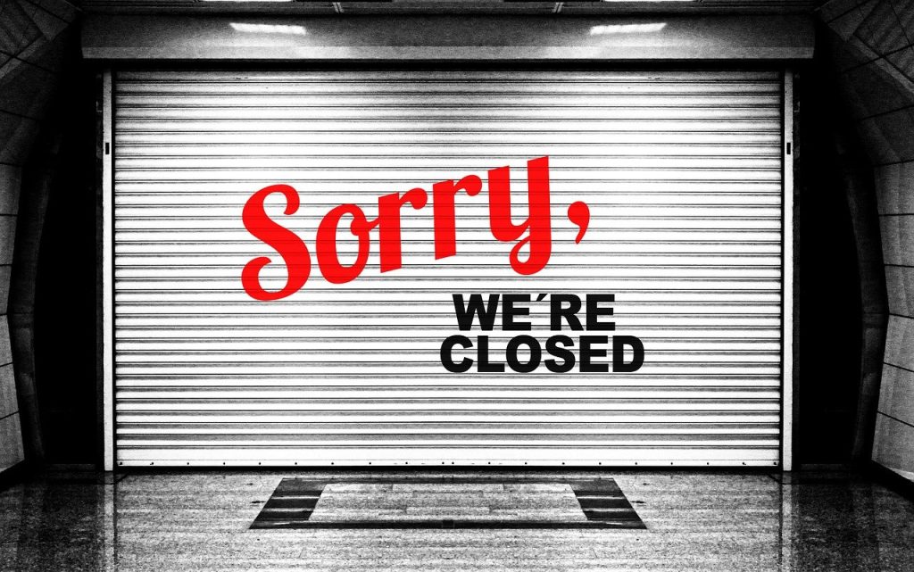 door sign that reads "Sorry, we're closed" indicating closed webpage