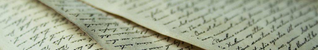 close-up of precise handwriting on pages of parchment
