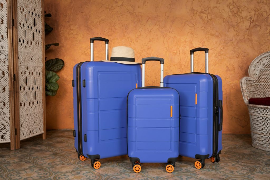 a set of blue luggage